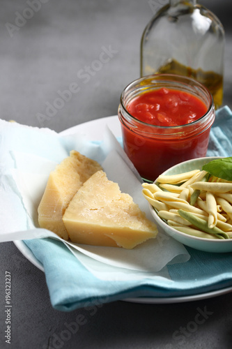Raw pasta and cheese