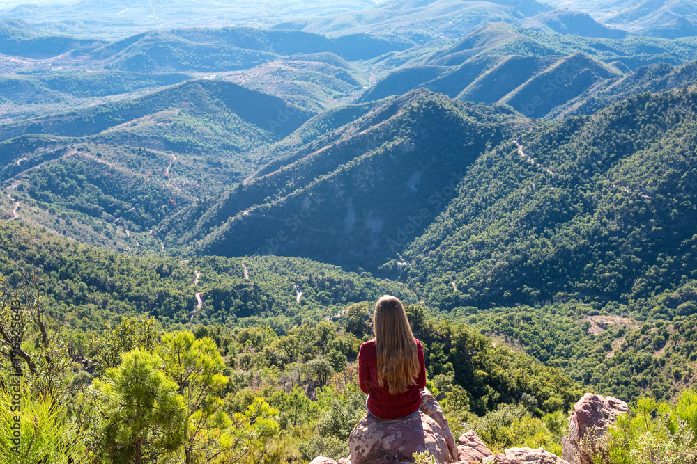 Woman enjoying beautiful landscape