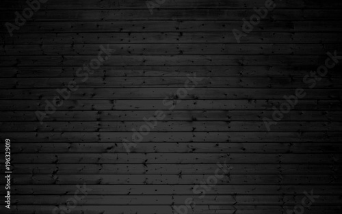 Dunkle Holzwand mit schwarzen Brettern