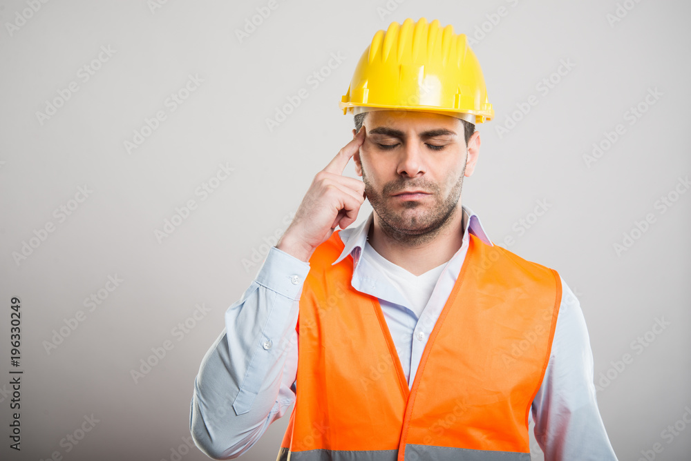 Portrait of attractive architect making concentrating gesture Portrait of attractive architect making concentrating gesture