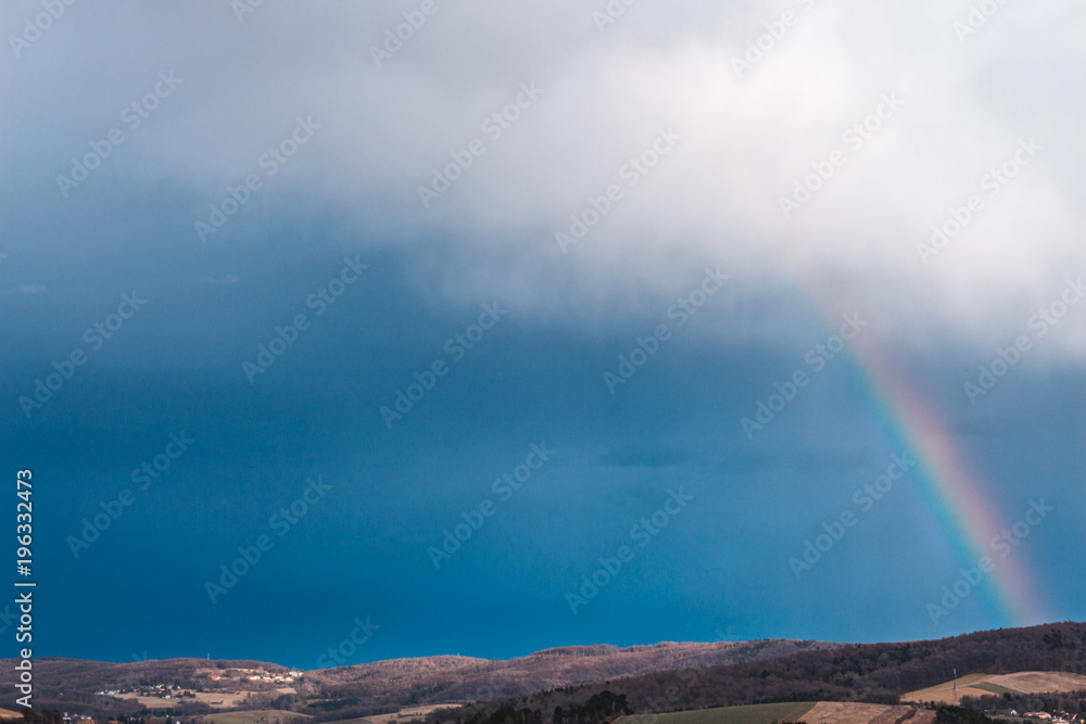 rainbow over rural fields