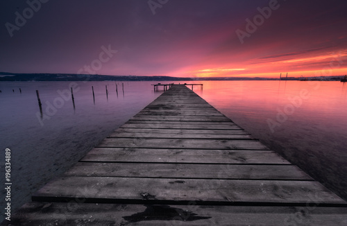Colors of sunset and the old rusty pier