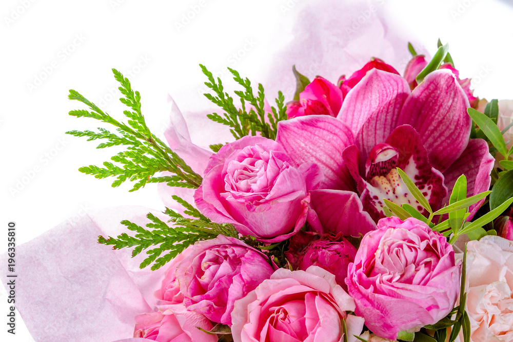 Bright buketny composition from fresh flowers, the white isolated background Bright buketny composition from fresh flowers, the white isolated background