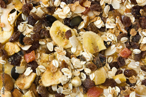 Muesli and dried fruit background. Top view