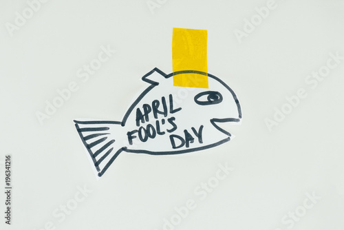 Canvastavla close up view of hand drawn fish with april fools day lettering and sticky tape