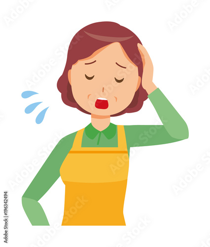 A middle-aged housewife wearing an apron is tired