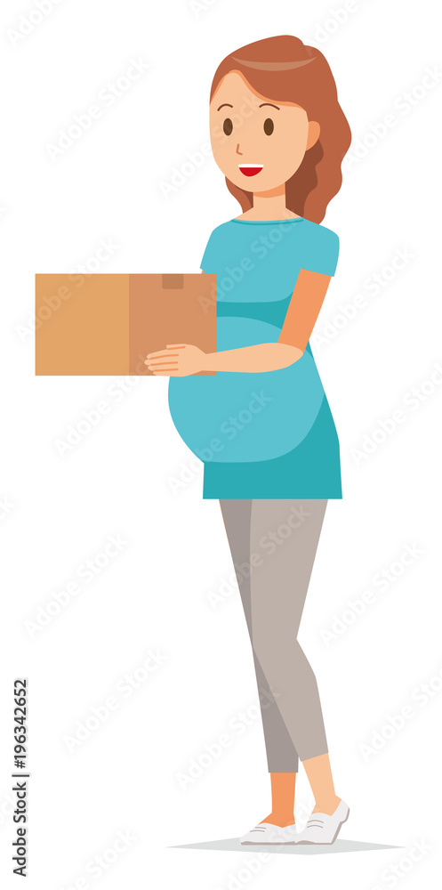 A pregnant woman wearing green clothes has a box A pregnant woman wearing green clothes has a box