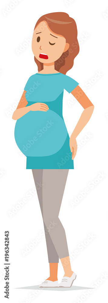 A pregnant woman wearing green clothes is touching her low back A pregnant woman wearing green clothes is touching her low back
