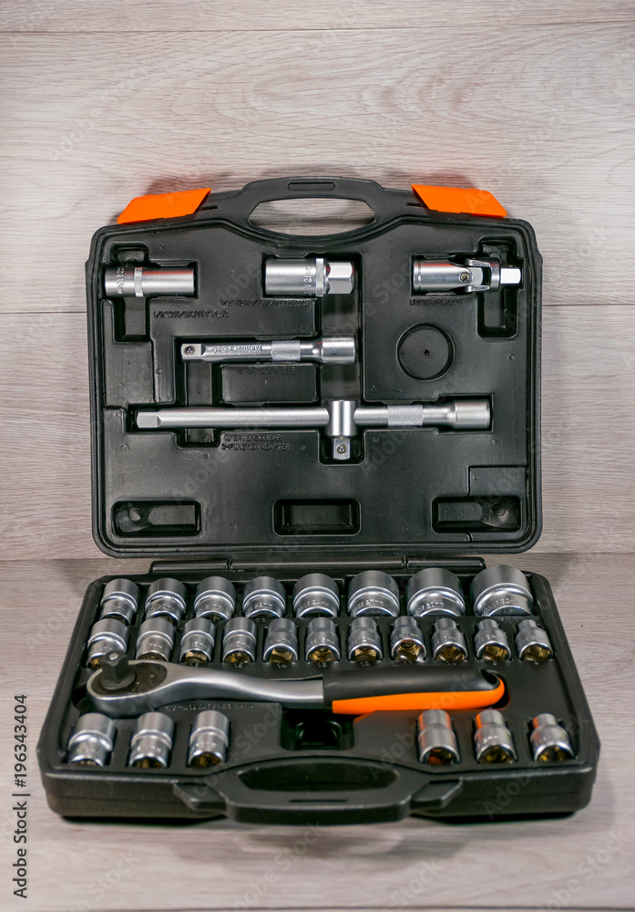 A set of new heads with ratchet wrenches for car repairs. A set of new heads with ratchet wrenches for car repairs.