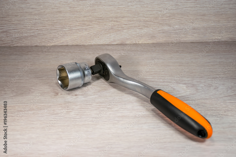 A set of new heads with ratchet wrenches for car repairs. A set of new heads with ratchet wrenches for car repairs.