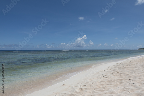 Beautiful ocean beach under blue sky for special summer  vacarion on the tropical island