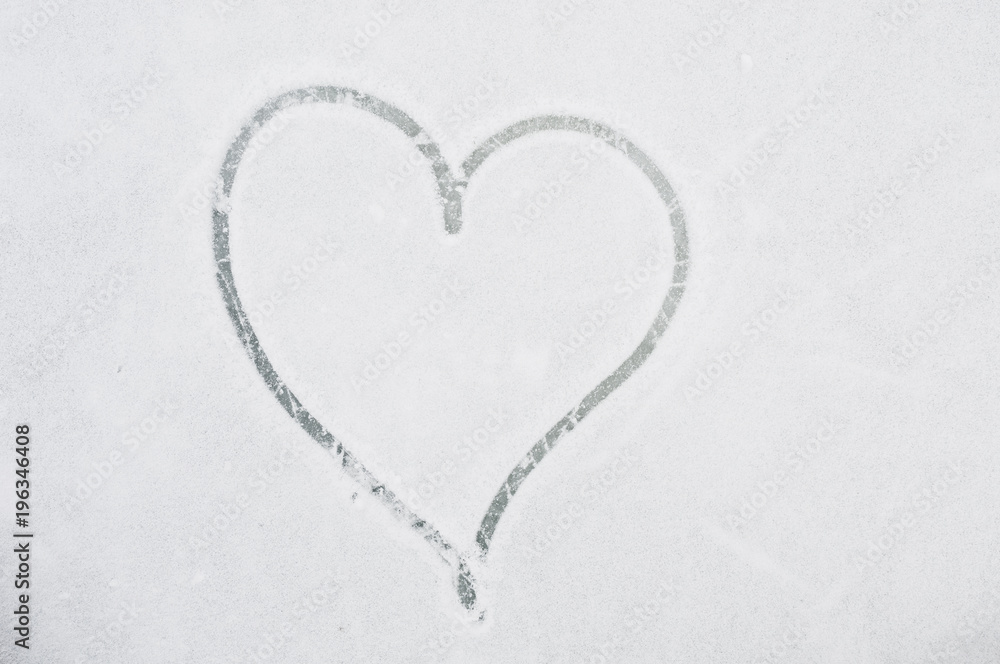 Heart drawn on the snow