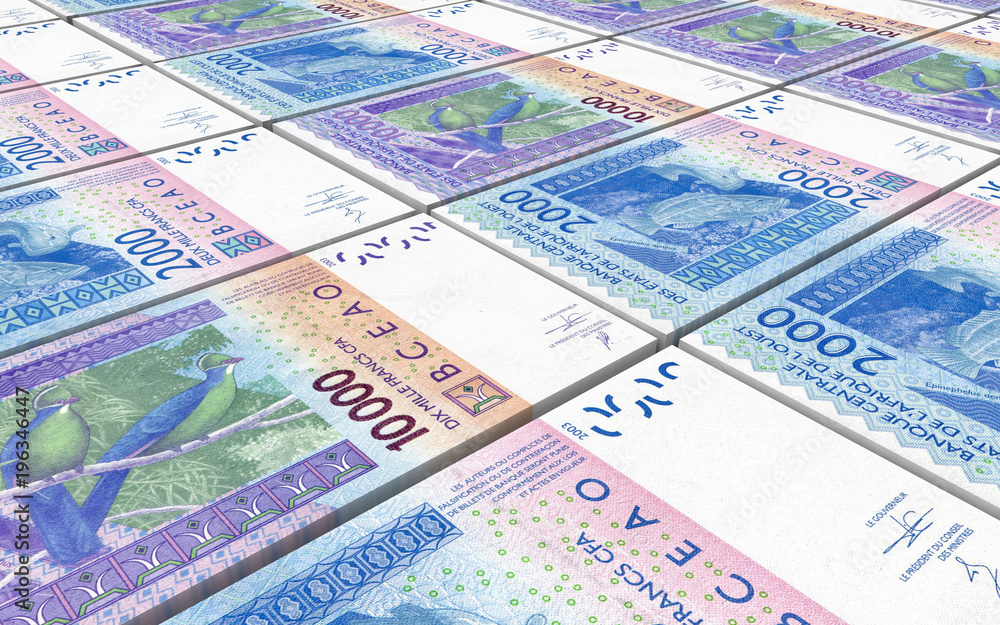 West African CFA francs bills stacked background. 3D illustration. West African CFA francs bills stacked background. 3D illustration.