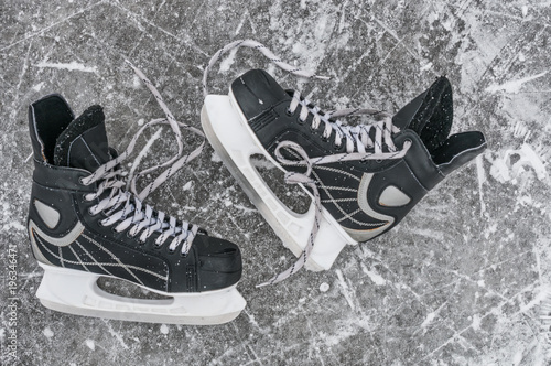 Pair skates on the ice rink
