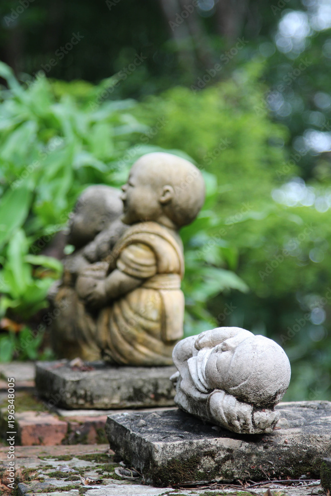 Buddha statue in sleeping action on the stone.