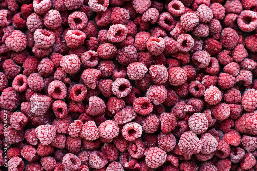 View from above on frozen raspberries. - obrazy, fototapety, plakaty 