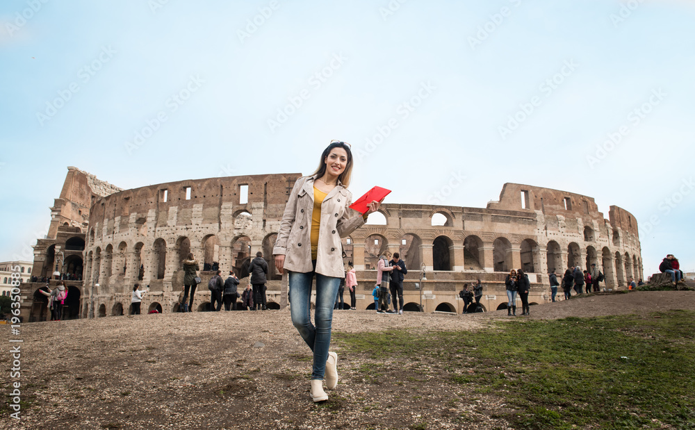 Tourist at colosseum monument in Rome