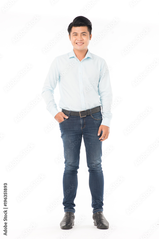 Portrait of confident Asian man wearing shirt and jeans posing on white background Portrait of confident Asian man wearing shirt and jeans posing on white background