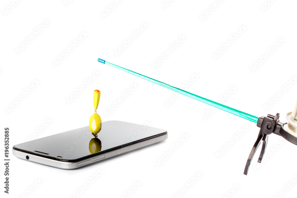 winter fishing rod with float in the smartphone screen. concept of waiting information winter fishing rod with float in the smartphone screen. concept of waiting information