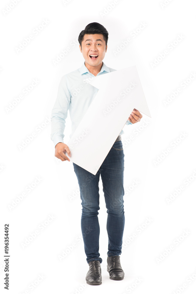 Young Asian man holding white paper array sign Young Asian man holding white paper array sign