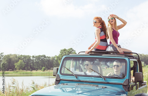 Girls in cabriolet photo