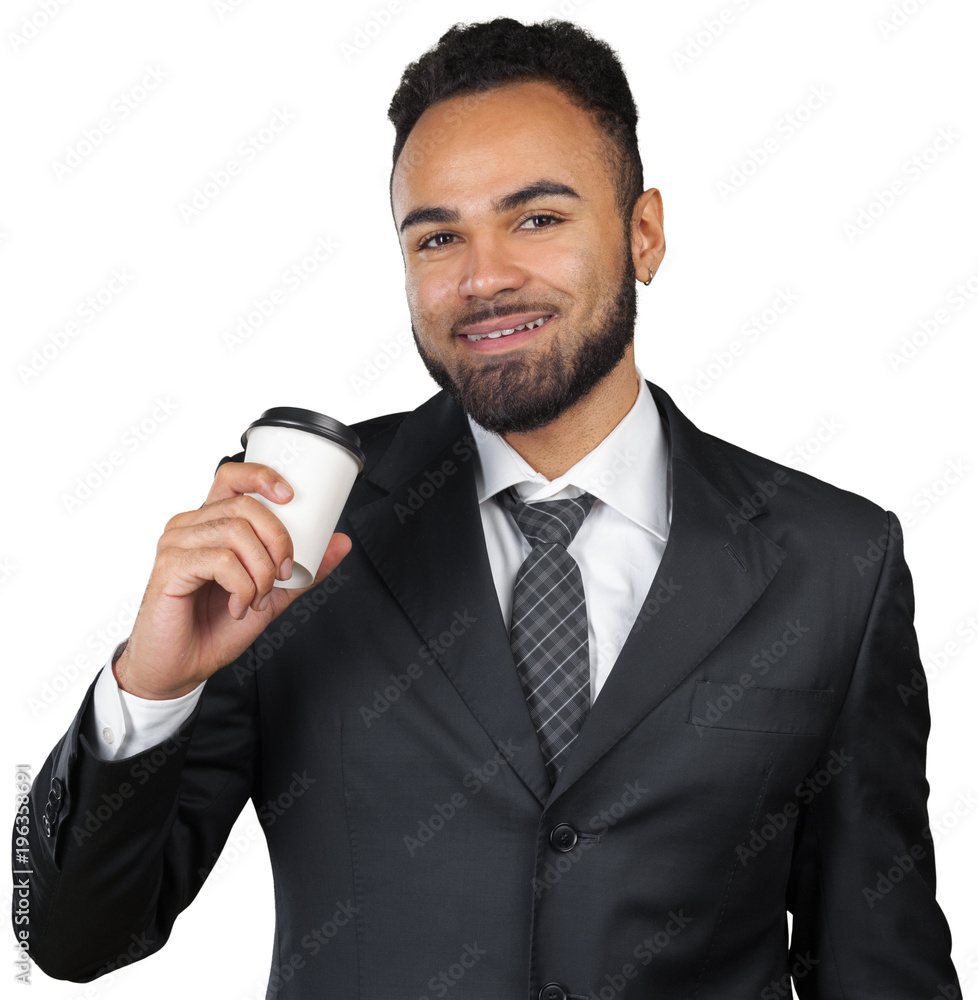 Portrait of a handsome businessman with a cup of coffee. Portrait of a handsome businessman with a cup of coffee.