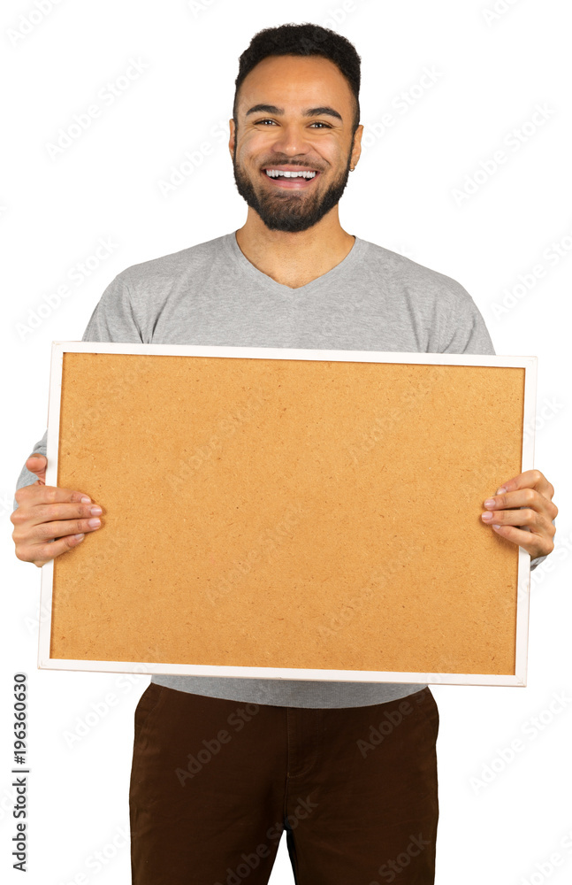 Portrait of a happy afro american man holding blank board isolated on a white background Portrait of a happy afro american man holding blank board isolated on a white background