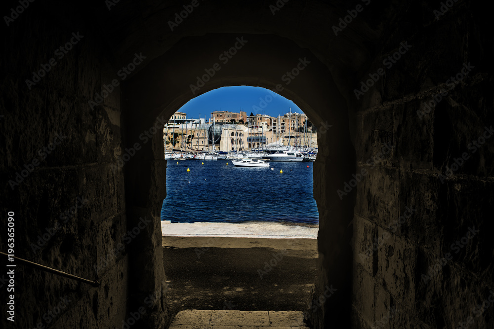 Watching the Harbour through an Archway