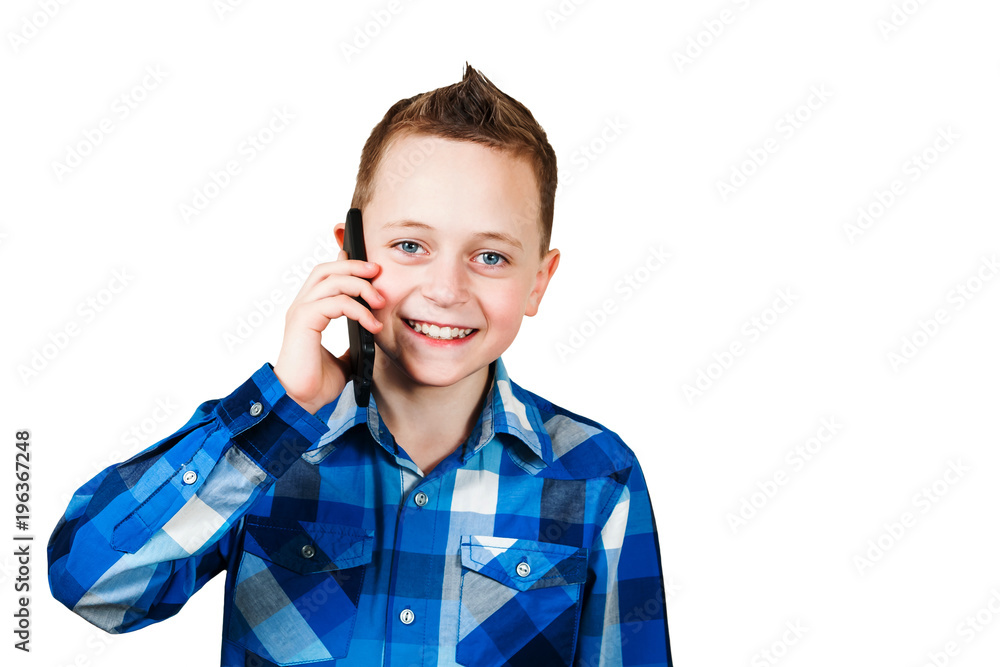 Boy holding mobile phone and smiles, Isolated on white.