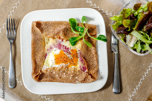 Tableau sur toile Breton crepe with egg in white plate
