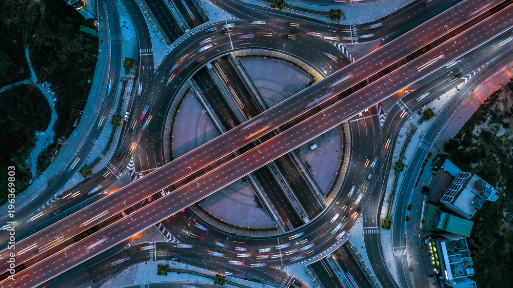 Expressway top view, Top view over the highway, expressway and motorway at night, Aerial view interchange of a city, Shot from drone, Expressway is an important infrastructure. - obrazy, fototapety, plakaty 
