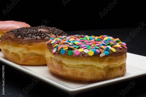 fresh donuts on a plate