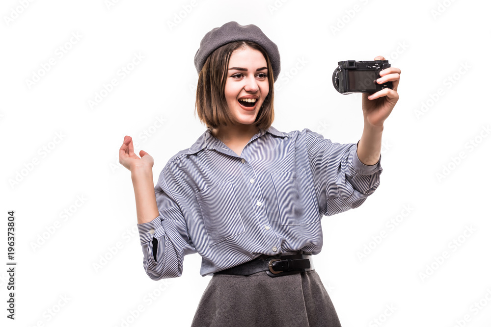 Portrait of a happy woman blogger wearing beret speak to camera while record video isolated over white background Portrait of a happy woman blogger wearing beret speak to camera while record video isolated over white background