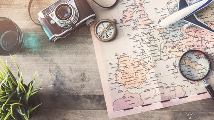 Travel concept on wooden background 