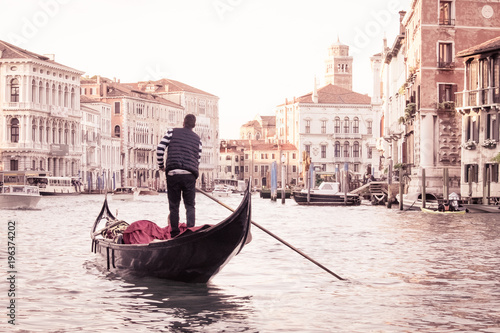 Man on gondola in Venice , Italian street on water, Venetian taxi on water, Symbol of Italian Venice, Beautiful nooks in Venice, Italian street on water, Man on gondola in Venice © marvlc