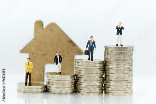 Business consultants on financial transactions for home loan, miniature people. Image use for financial, business concept.