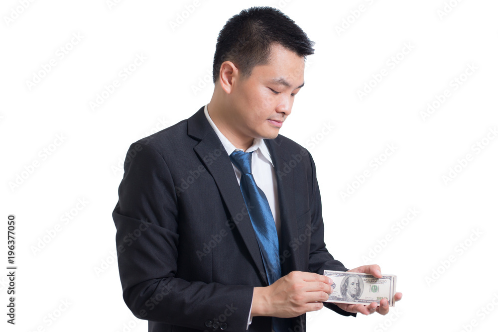 Portrait of Confident young asian businessman looking to the right side. Hands counting dollar banknotes, Businessman Hands counting us dollar bills isolated on white background. Business concept Portrait of Confident young asian businessman looking to the right side. Hands counting dollar banknotes, Businessman Hands counting us dollar bills isolated on white background. Business concept