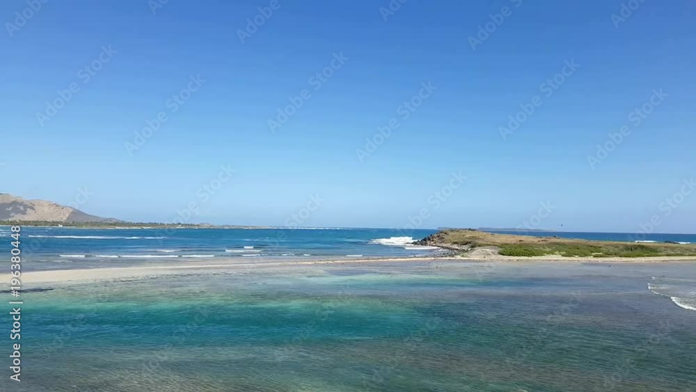 Coralita beach a quiet, deserted beach on French St. Martin. This peaceful beach is a good spot for families lodging in the Oyster Pond area Coralita beach a quiet, deserted beach on French St. Martin. This peaceful beach is a good spot for families lodging in the Oyster Pond area