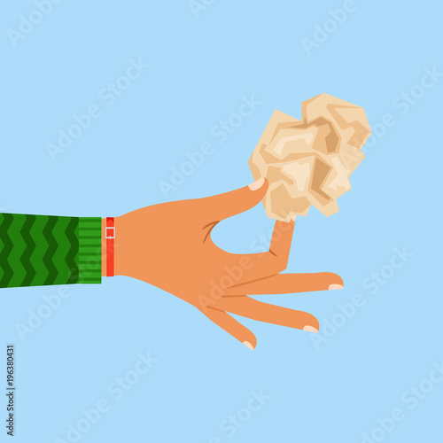 Woman hand holding crumpled paper sheet