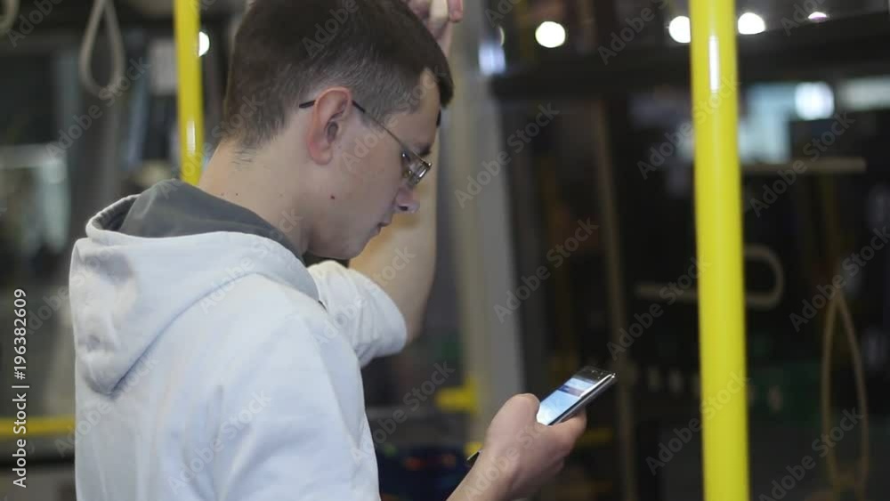 Business woman enjoys a tablet and a smartphone. Printing on a modern laptop at an exhibition of advanced technologies and innovations. Upgraded gadgets for young people.