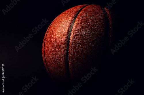 basketball ball on black background. © The Len