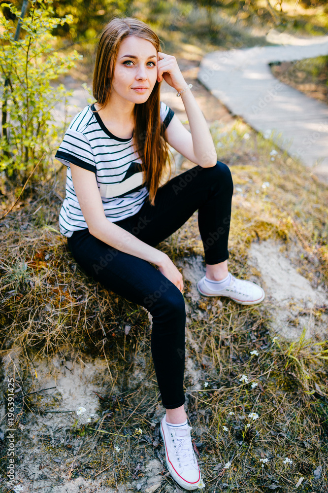 Young amazing beautiful girl outdoor nature portrait. Fashionable stylish teen with passionate expressive face posing at camera. Blue eyed lovely fabulous brunette woman relaxing in summer wonderland. Young amazing beautiful girl outdoor nature portrait. Fashionable stylish teen with passionate expressive face posing at camera. Blue eyed lovely fabulous brunette woman relaxing in summer wonderland.
