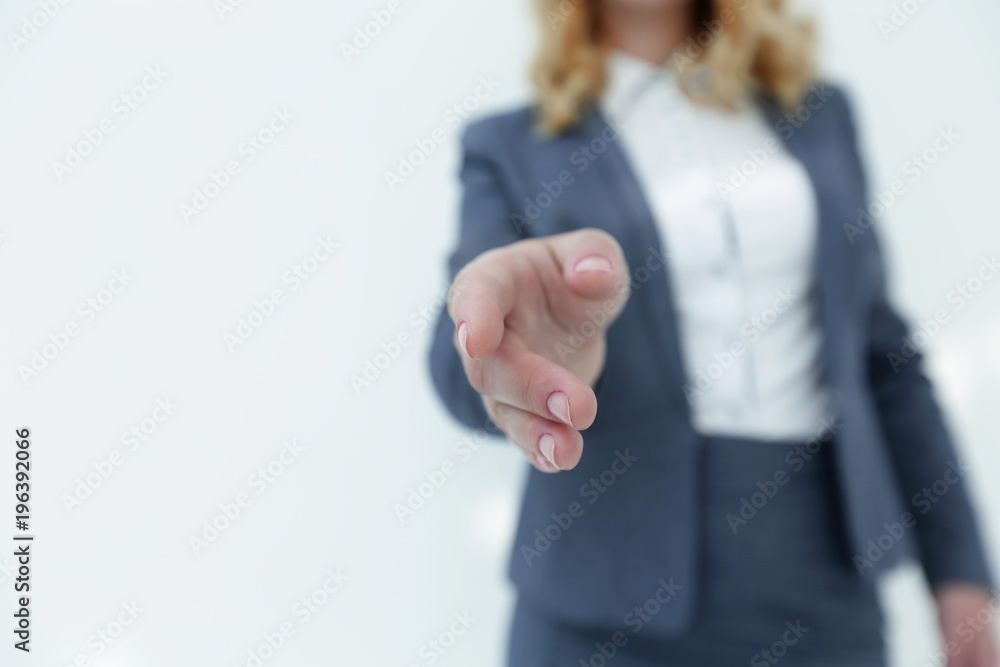 closeup. business woman stretching hand for handshake