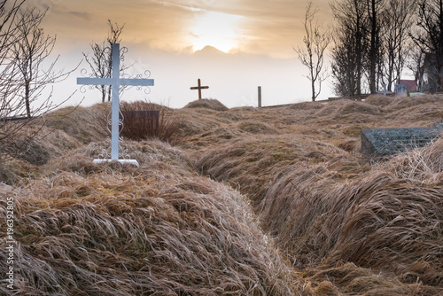 Obraz na plátně Kálfafellsstadur Church Graveyard in Iceland at Sunset with Crosses in Foregroun