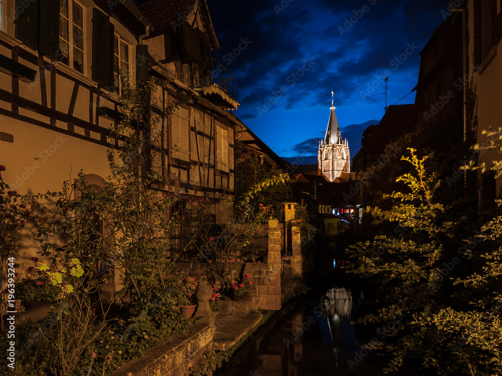 Church St. Peter et Paul in Wissembourg, France on a cloudy night