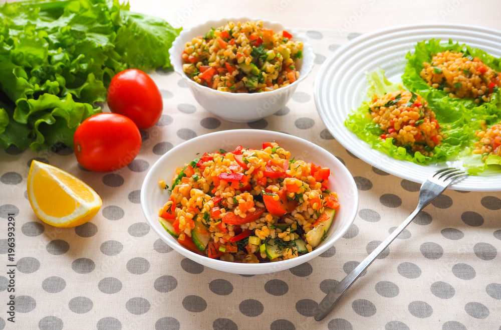Fresh lunch salad with vegetables and bulgur.
Fresh lunch salad with vegetables and bulgur.