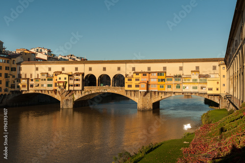 Bridge Ponte Vecchio in Florence on a sunny day in autumn