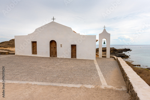 White orthodox church on the sea coast in Agios Nikolaos, Zakynthos island, Greece