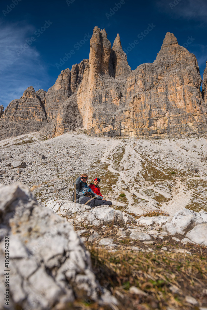 young couple in italien dolomites, mountain lovers and tourist, europien alps in summer