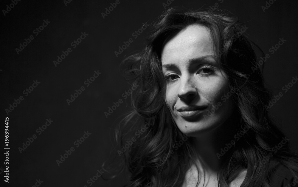 Black and white Portrait of beautiful young smiling tender woman. People concept. Black and white Portrait of beautiful young smiling tender woman. People concept.